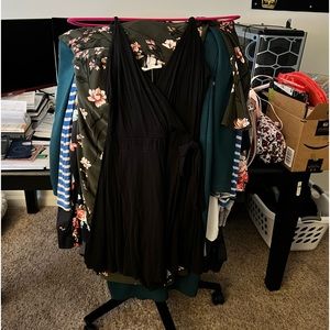 Black romper with skirt in front